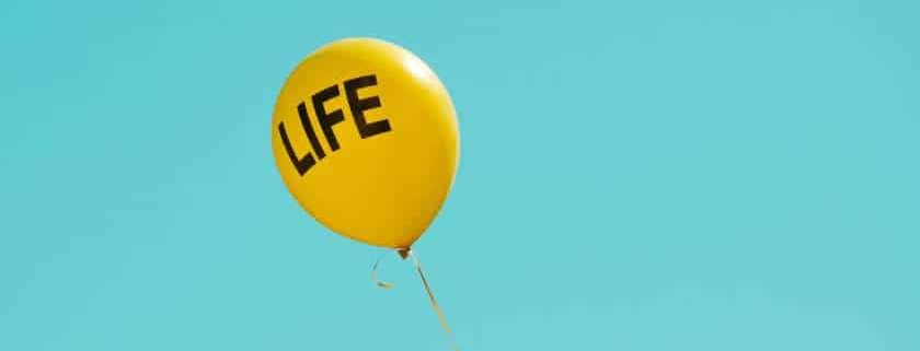 yellow balloon with life text and what does god say about abortions