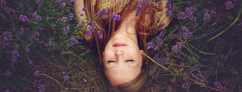 girl lying on lavender field and peace meaning in the bible