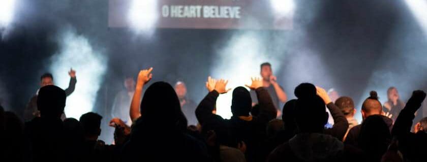 people singing and praising and god inhabits the praises of his people