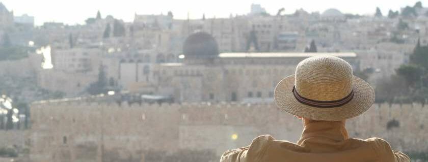 man wearing hat overlooking the community view and why did god choose israel