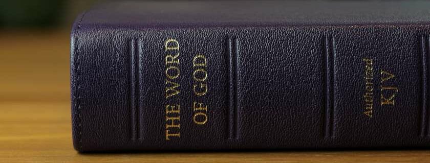 the word of god bible on table and bible verses about the word of god