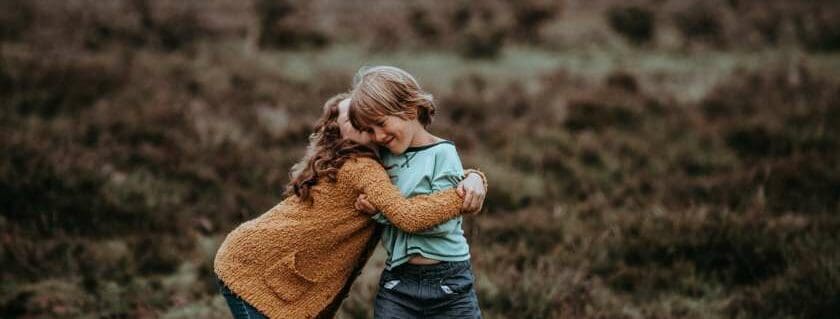 boy and girl hugging and reconcile with god