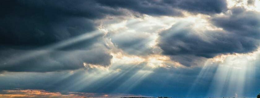 dark clouds with rays of sunshine