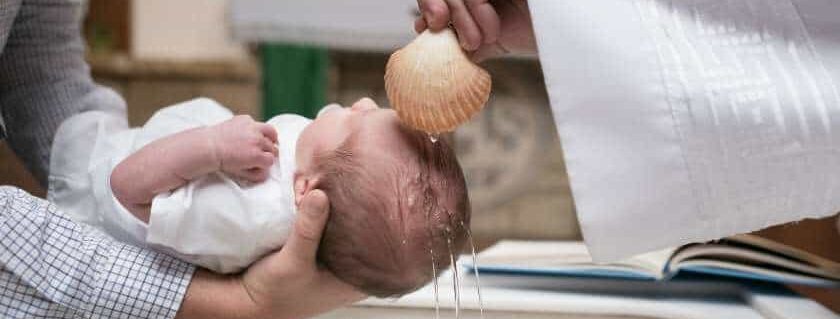 a baby being baptized