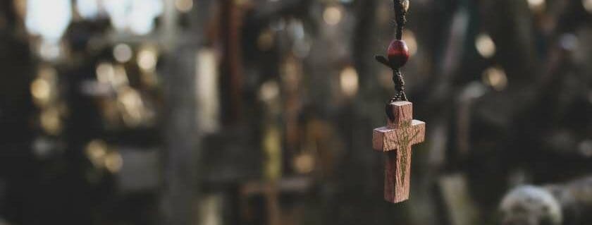 a hanging rosary cross